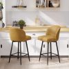 The bar stools feature an arched backrest and seat design, and are paired with black metal thin legs