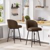 The bar stools feature an arched backrest and seat design, and are paired with black metal thin legs
